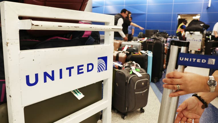 United on sale checked bag