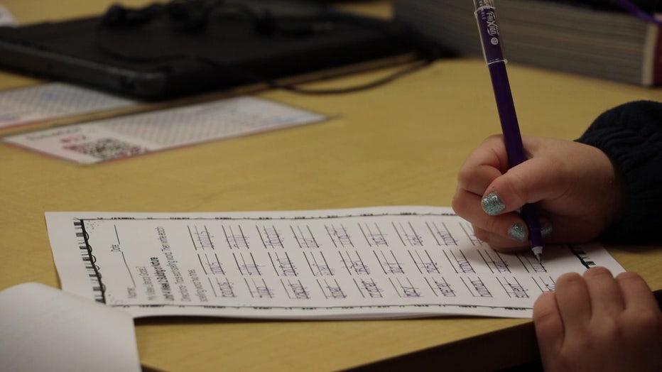 A student works on classwork at Waterset Charter. 