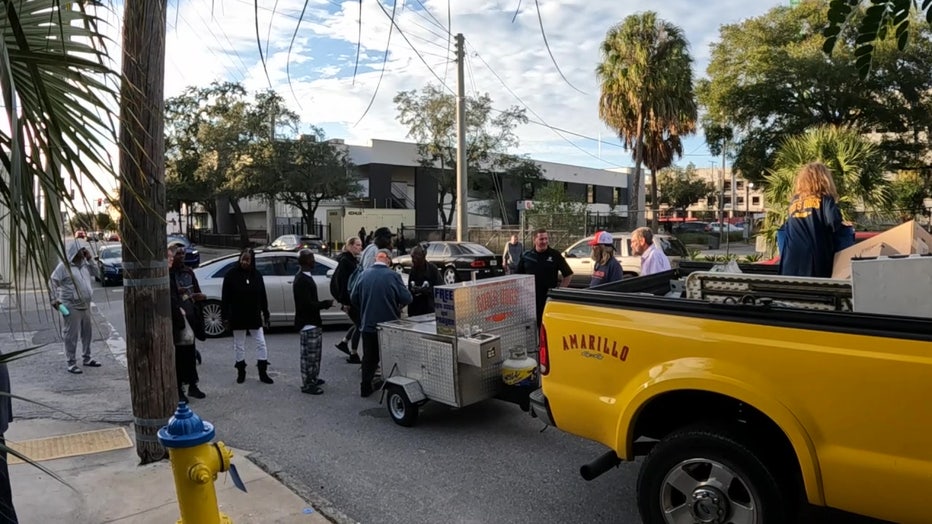 Williams hands out hot dogs to the homeless once a week.