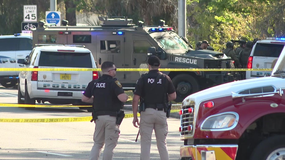 Law enforcement officers at scene of officer-involved shooting in Sarasota.