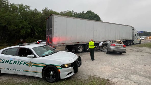 Lakeland man dies after car becomes wedged under semi-truck during crash: PCSO