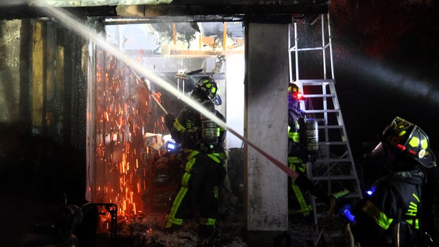 Hillsborough County crews battle early morning house fire in Lutz