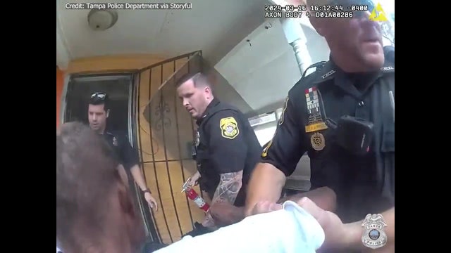 Video: Tampa man trapped inside home filling with smoke rescued by police