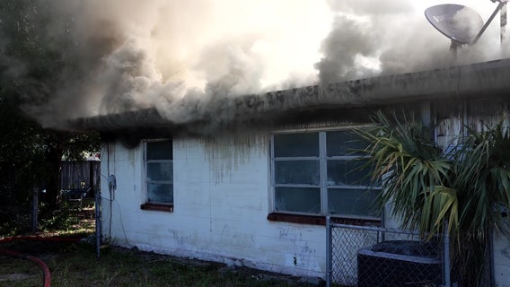 PHOTOS: Tampa house engulfed in flames, HCFR says fire considered suspicious
