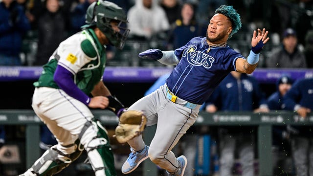 Yandy Diaz caps late rally with 2-run single, Rays beat the Rockies 8-6 for 1st road win