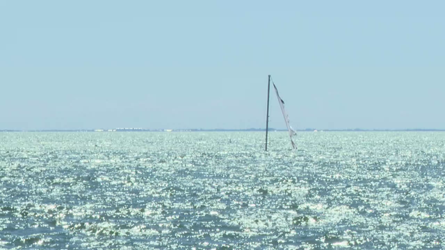 Sunken sailboat attracting attention in St. Pete, city unsure when it will be removed