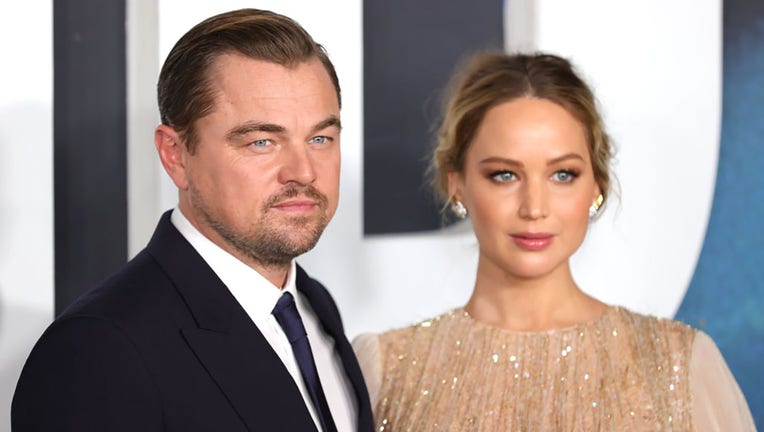 FILE - Leonardo DiCaprio and Jennifer Lawrence attend the world premiere of Netflixs