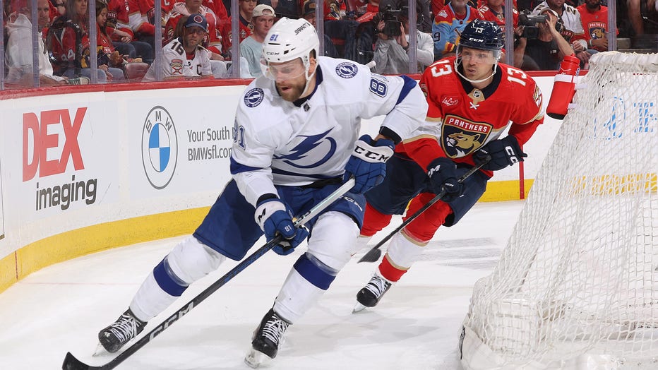 SUNRISE, FL - APRIL 21: Sam Reinhart #13 of the Florida Panthers pursues Erik Cernak #81 of the Tampa Bay Lightning during second period action in Game One of the First Round of the 2024 Stanley Cup Playoffs at the Amerant Bank Arena on April 21, 2024 in Sunrise, Florida. (Photo by Joel Auerbach/Getty Images)