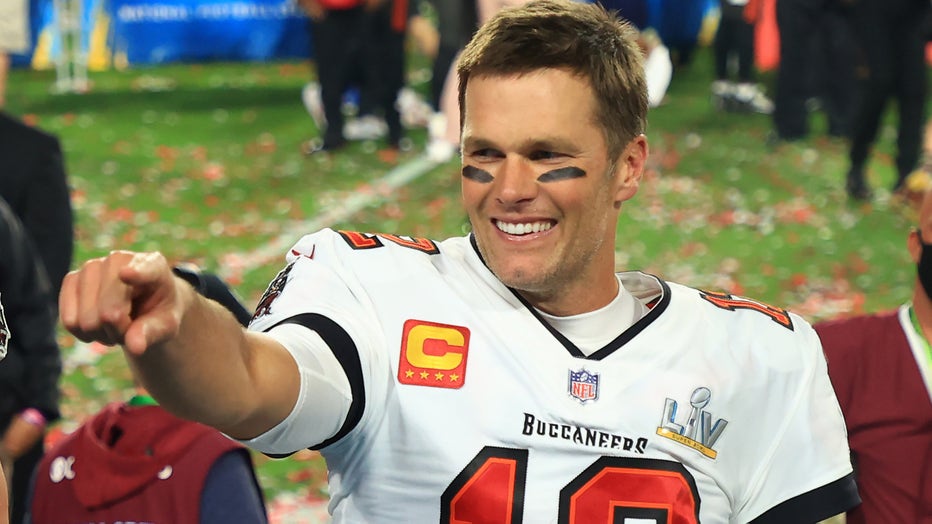TAMPA, FLORIDA - FEBRUARY 07: Tom Brady #12 of the Tampa Bay Buccaneers celebrates after defeating the Kansas City Chiefs in Super Bowl LV at Raymond James Stadium on February 07, 2021 in Tampa, Florida. The Buccaneers defeated the Chiefs 31-9. (Photo by Mike Ehrmann/Getty Images)