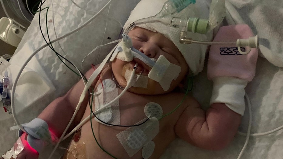 Kayley Tooker was put into a coma and laid on a hypothermia cooling mattress to reduce body temperature to slow down brain injury.