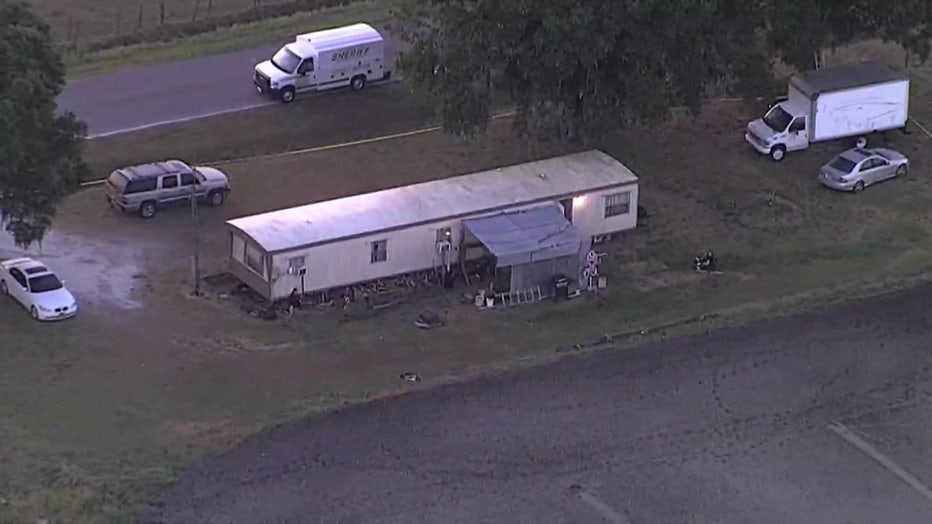 Deputies say a woman and her 4-year-old child were stabbed to death at a Dover mobile home. 
