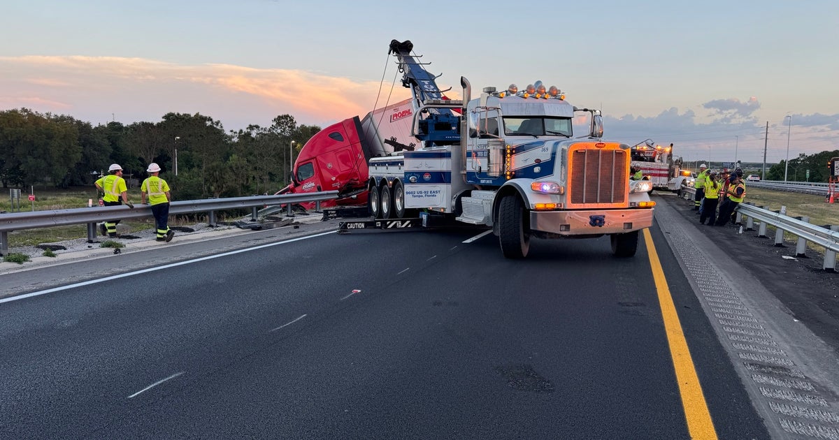 Crash leaves semi dangling off overpass on Polk Parkway | FOX 13 Tampa Bay