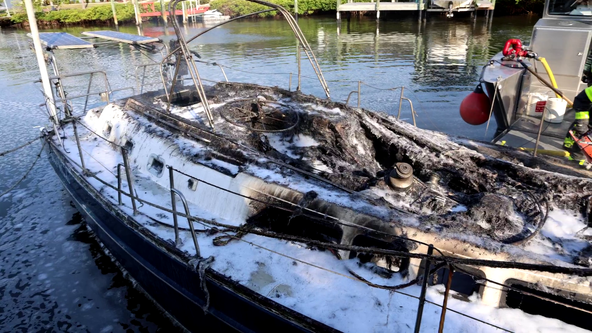 PHOTOS: Fire destroys 45-foot sailboat docked behind Apollo Beach home