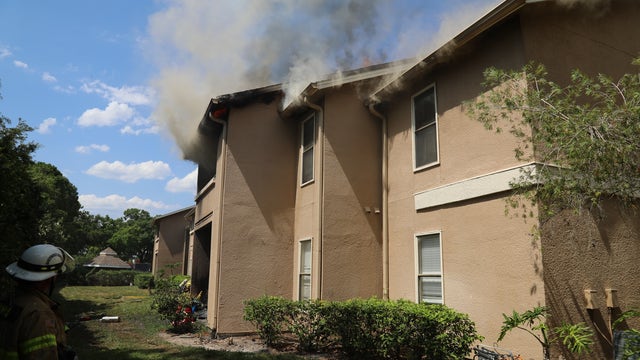 Several families displaced after fire spreads through Tampa apartment building