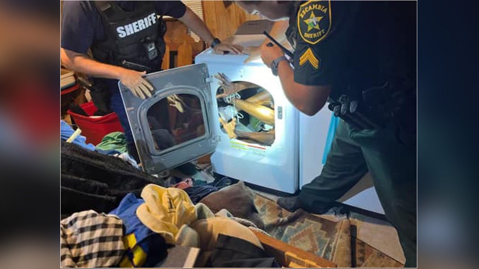 Deputy's found Jackson hiding inside a dryer. Image is courtesy of the Escambia County Sheriff's Office.
