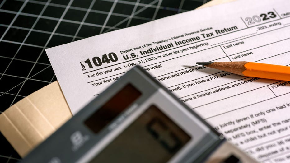 FILE - In this photo illustration, a 1040 U.S. Individual Income Tax Return document is seen on a desk on April 15, 2024, in North Haledon, New Jersey. (Photo illustration by Michael Bocchieri/Getty Images)