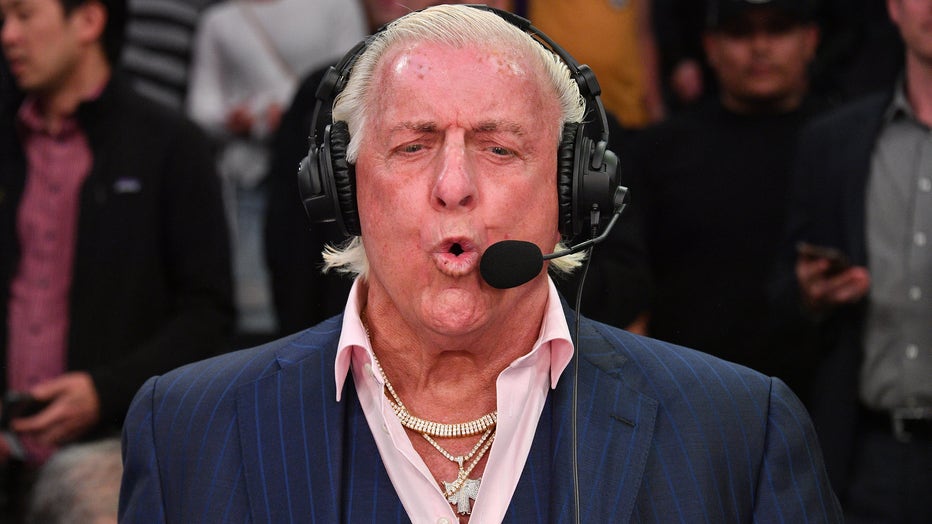 LOS ANGELES, CALIFORNIA - FEBRUARY 25: Ric Flair joins a telecast during a basketball game between the Los Angeles Lakers and the New Orleans Pelicans at Staples Center on February 25, 2020 in Los Angeles, California. (Photo by Allen Berezovsky/Getty Images)