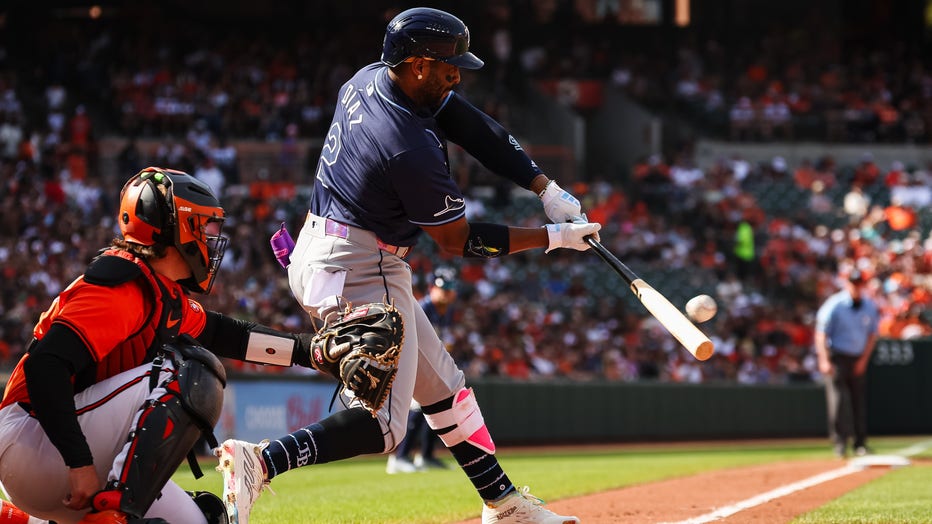 BALTIMORE, MD - JUNE 01: Yandy Díaz #2 of the Tampa Bay Rays hits a two RBI triple against the Baltimore Orioles during the second inning at Oriole Park at Camden Yards on June 1, 2024 in Baltimore, Maryland. (Photo by Scott Taetsch/Getty Images)