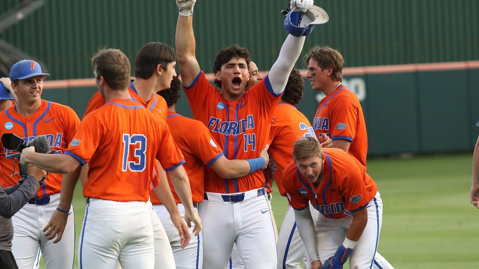 Michael Robertson's Two-run Double In 13th Inning Lifts Florida Over 