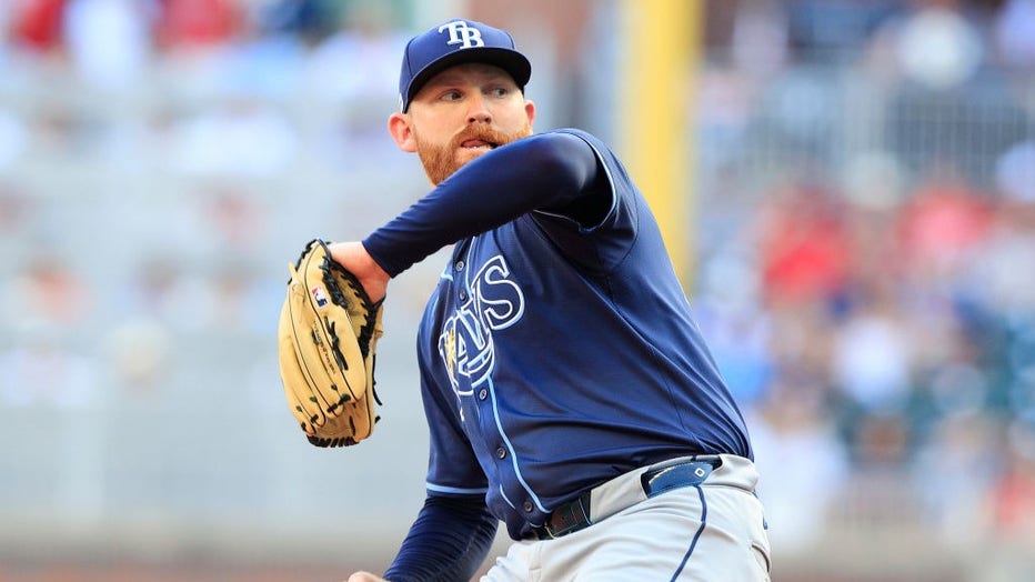 ATLANTA, GA - JUNE 14: Tampa Bay Rays starting pitcher Zack Littell #52 delivers a pitch during the Friday evening MLB game between the Atlanta Braves and the Tampa Bay Rays on June 14, 2024 at Truist Park in Atlanta, Georgia. (Photo by David J. Griffin/Icon Sportswire via Getty Images)