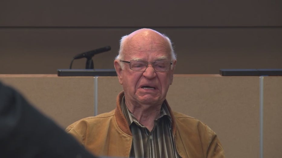 Victor Sparks told a jury that he saw five people lying face-down on the bank floor on Jan. 23, 2019, and that he heard two bangs as he walked back to his car.