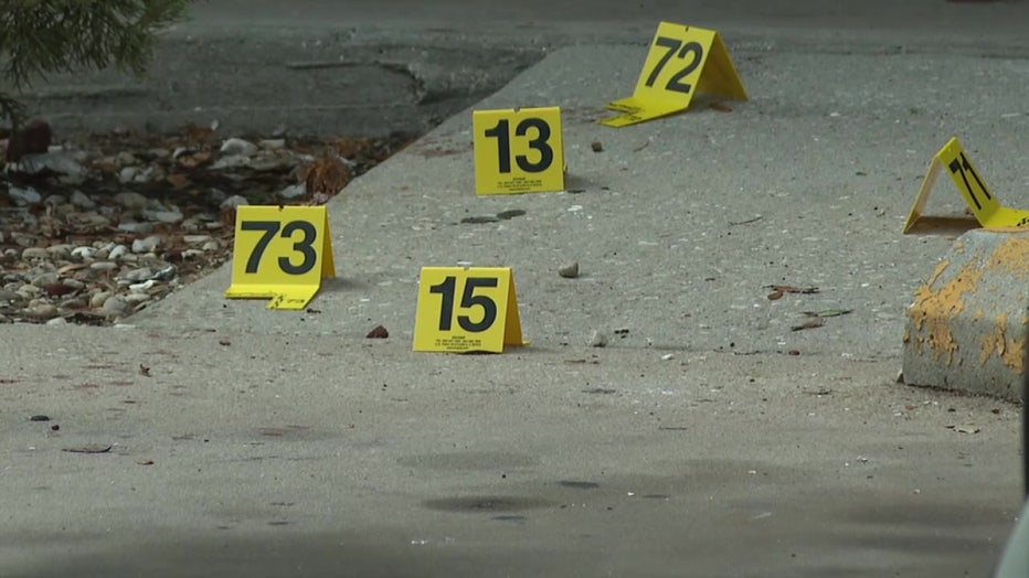 Evidence markers dot the parking lot in front of a Sarasota hookah lounge.