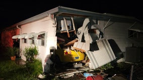 Driver injured after crashing into mobile home in Brooksville