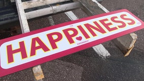 'If there was a time for happiness, it's now:' Happiness Experiment changes lives through signs