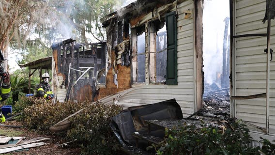 Firefighter hospitalized after battling flames at Hillsborough County home