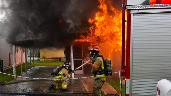 PHOTOS: Lakeland mobile home struck by lightning, destroyed after fire