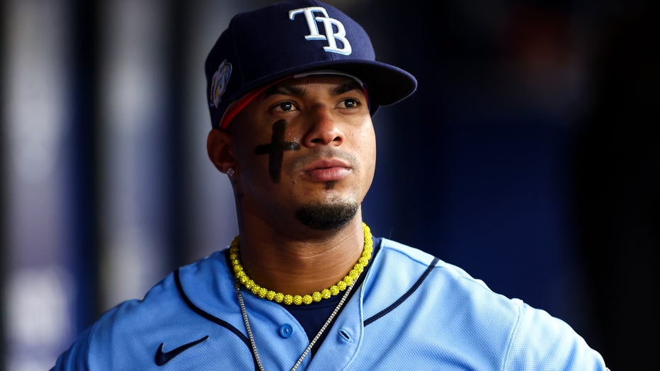 ST PETERSBURG, FLORIDA - APRIL 08: Wander Franco #5 of the Tampa Bay Rays looks on from the dugout during the third inning against the Oakland Athletics at Tropicana Field on April 08, 2023 in St Petersburg, Florida. (Photo by Kevin Sabitus/Getty Images)