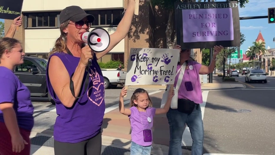 The Benefield's daughter was among those protesting to keep Ashley Benefield out of jail.