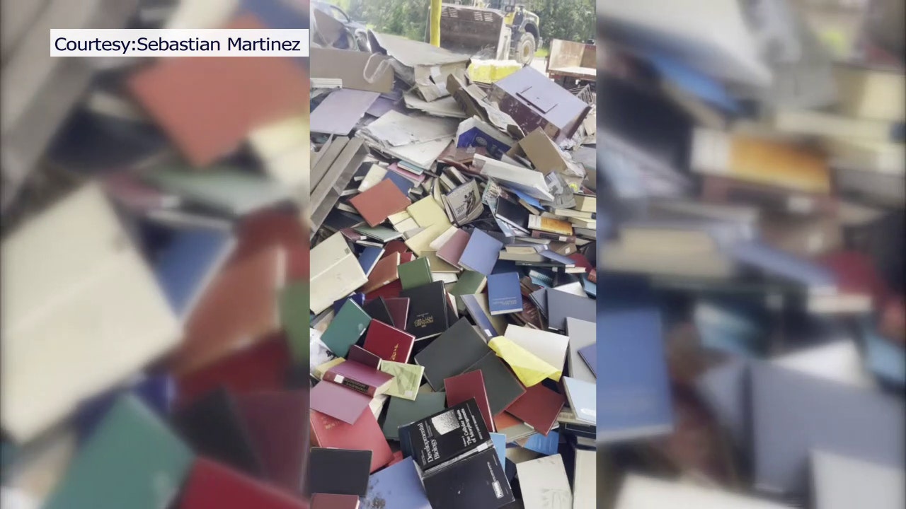 Hundreds of books from New College dumped while students work to