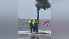 Florida rescue team saves American flag as Debby roars by coastline