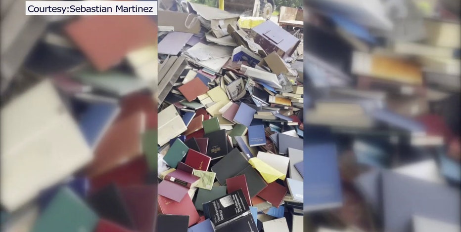 Hundreds of books from New College dumped while students work to