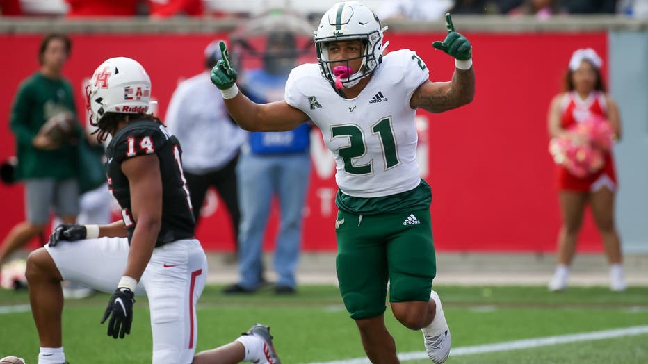 South Florida Bulls running back Brian Battie (21) celebrates after scoring a touchdown in the first quarter during the college football game between the South Florida Bulls and Houston Cougars on October 29, 2022 at TDECU Stadium in Houston, Texas. (Photo by Leslie Plaza Johnson/Icon Sportswire via Getty Images)