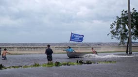 Watch: Pro-Trump boaters speed down flooded Tampa street