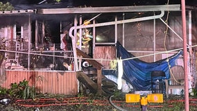 Firefighter hospitalized after battling fire at Hernando County home