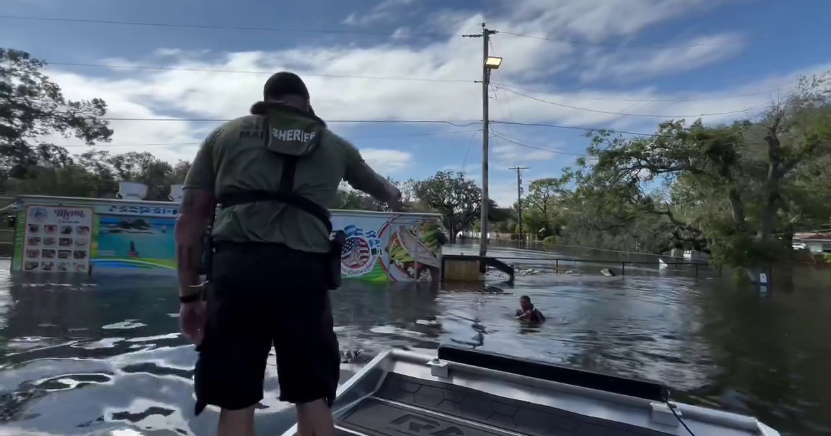 Teen rescued from floodwaters in north Tampa | FOX 13 Tampa Bay