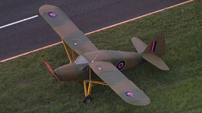 Small replica warplane makes emergency landing on Polk County highway