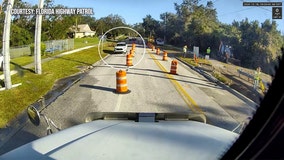 Driver hits Pinellas workers after blowing through barricades blocking flooded road: FHP