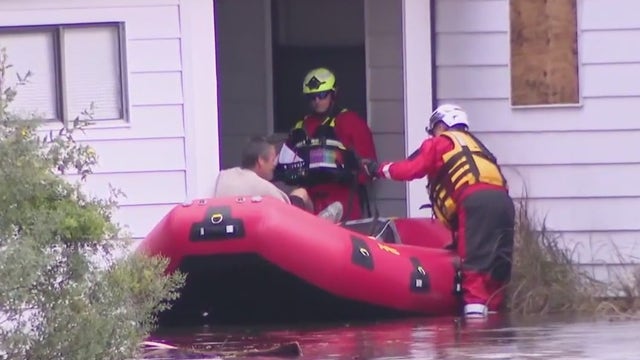 Rescue at flooded Plant City mobile home park leads to emotional reunion between mother and son