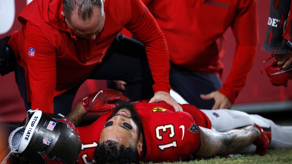 Mike Evans #13 of the Tampa Bay Buccaneers is injured during the second quarter against the Baltimore Ravens at Raymond James Stadium on October 21, 2024 in Tampa, Florida. (Photo by Mike Ehrmann/Getty Images)