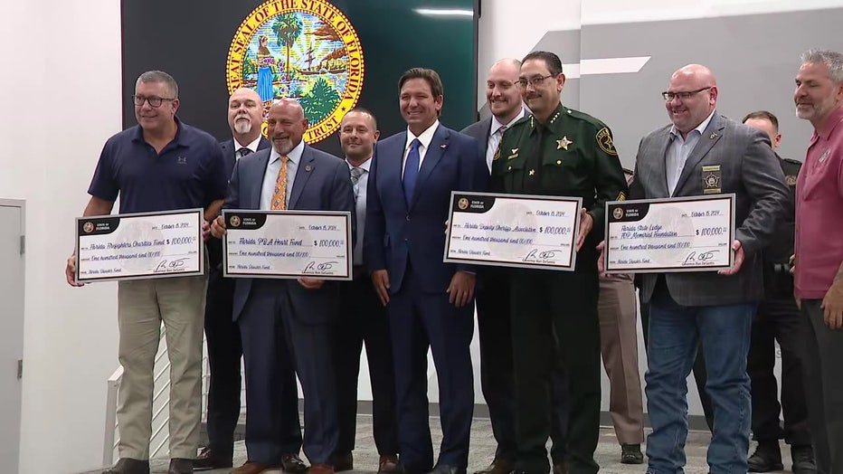 Governor Ron DeSantis awarding money to Hillsborough first responders after Hurricane Milton.