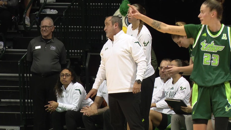 Jose Fernandez on the sideline of USF women's basketball game.