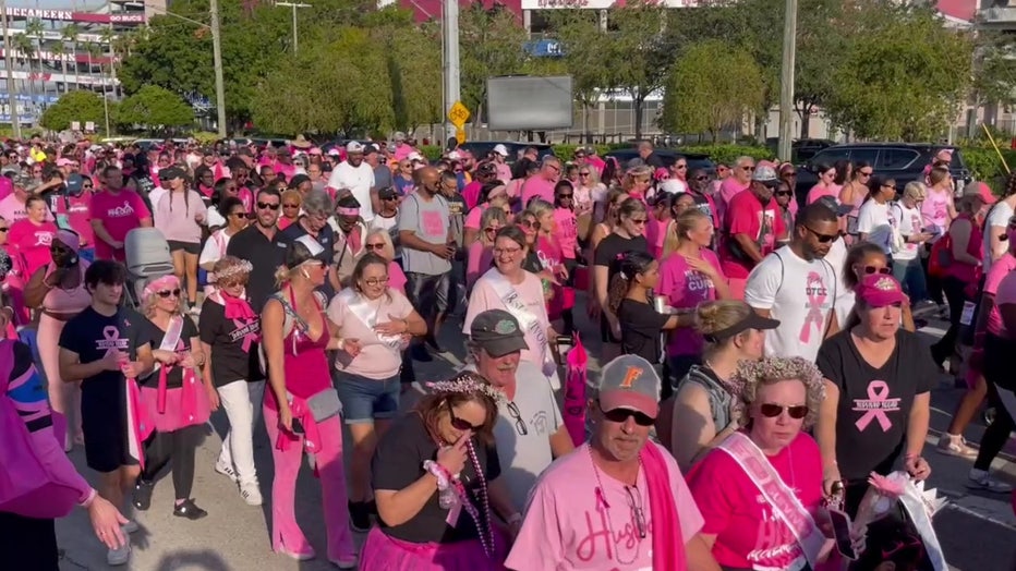 People participating in the Making Strides Breast Cancer Walk at Raymond James Stadium in Tampa.