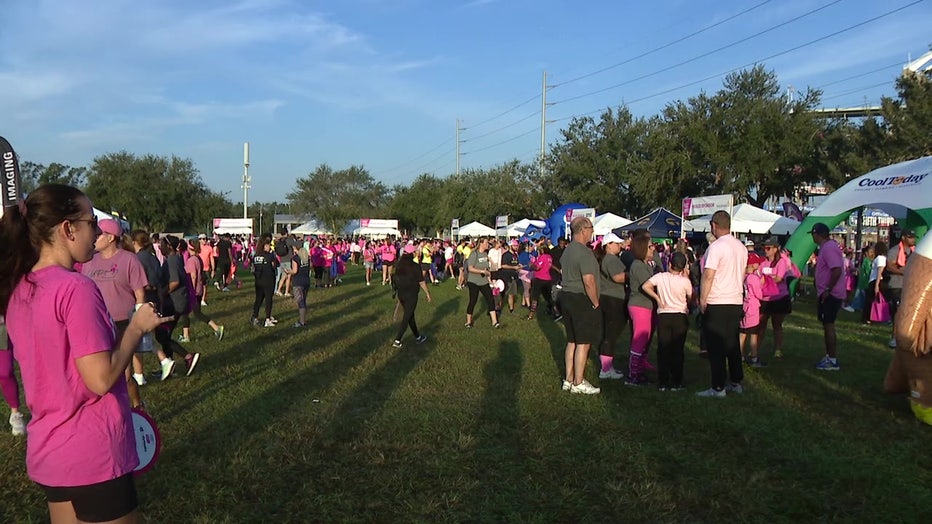 People attending the Making Strides Breast Cancer Walk at Raymond James Stadium in Tampa.