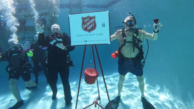Salvation Army of Manatee County takes a dive to kick off Red Kettle campaign
