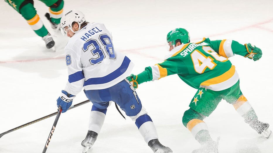 SAINT PAUL, MN - NOVEMBER 1: Brandon Hagel #38 of the Tampa Bay Lightning handles the puck with Jared Spurgeon #46 of the Minnesota Wild defending during the game at the Xcel Energy Center on November 1, 2024 in Saint Paul, Minnesota. (Photo by Bruce Kluckhohn/NHLI via Getty Images)