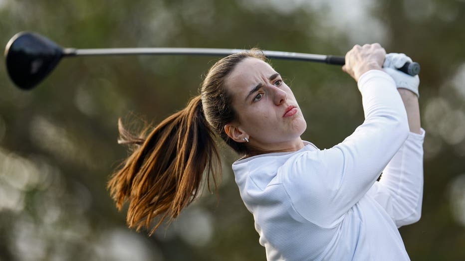 BELLEAIR, FLORIDA - NOVEMBER 13: Caitlin Clark, professional basketball player, plays her shot from the fifth tee during a Pro-Am prior to The ANNIKA driven by Gainbridge at Pelican 2024 at Pelican Golf Club on November 13, 2024 in Belleair, Florida. (Photo by Douglas P. DeFelice/Getty Images)